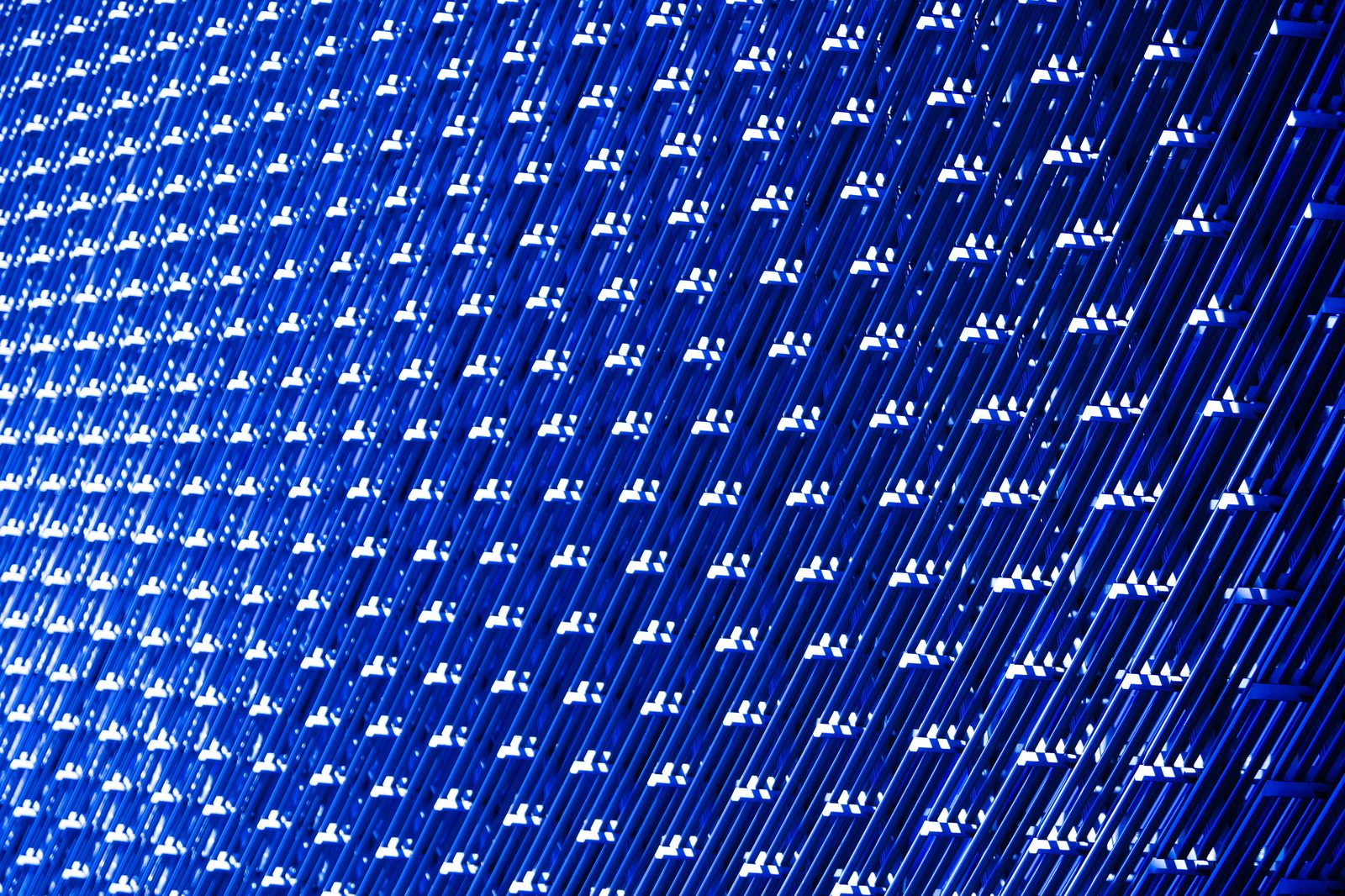 Detail of illuminated blue architectural panels